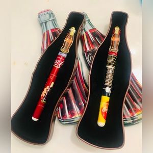 2 Vtg Coca Cola pen collections 1996